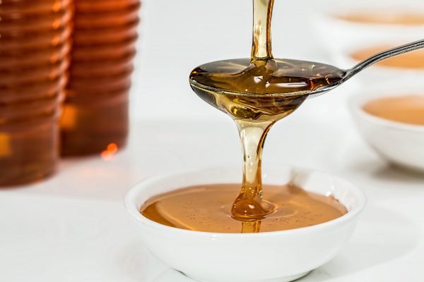 Honey in tea helps fight these cold and flu symptoms: sore throat, cough, and congestion 